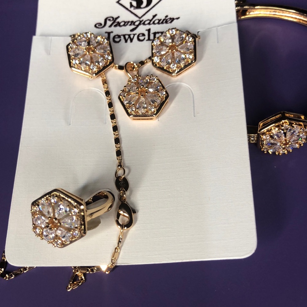 4 piece gold tone set